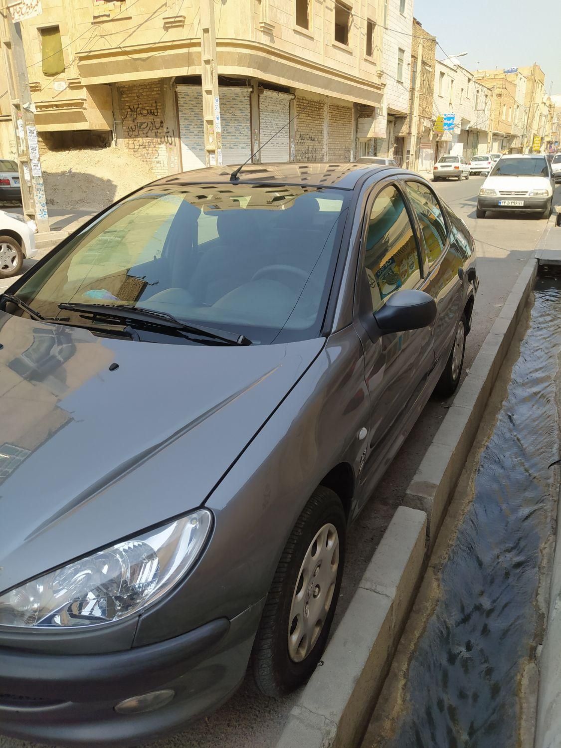 پژو ۲۰۶ صندوق دار v8 - 1391