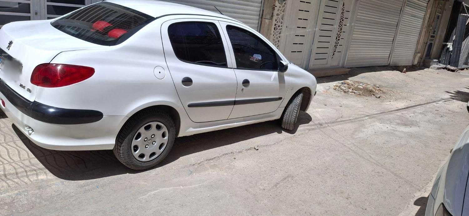 پژو ۲۰۶ صندوق دار v8 - 1399