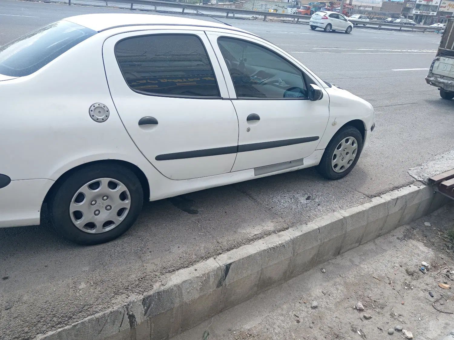 پژو ۲۰۶ صندوق دار v8 - 1394