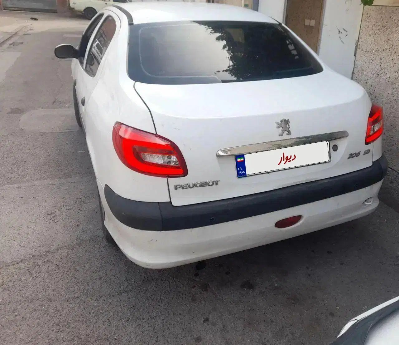 پژو ۲۰۶ صندوق دار v8 - 1394