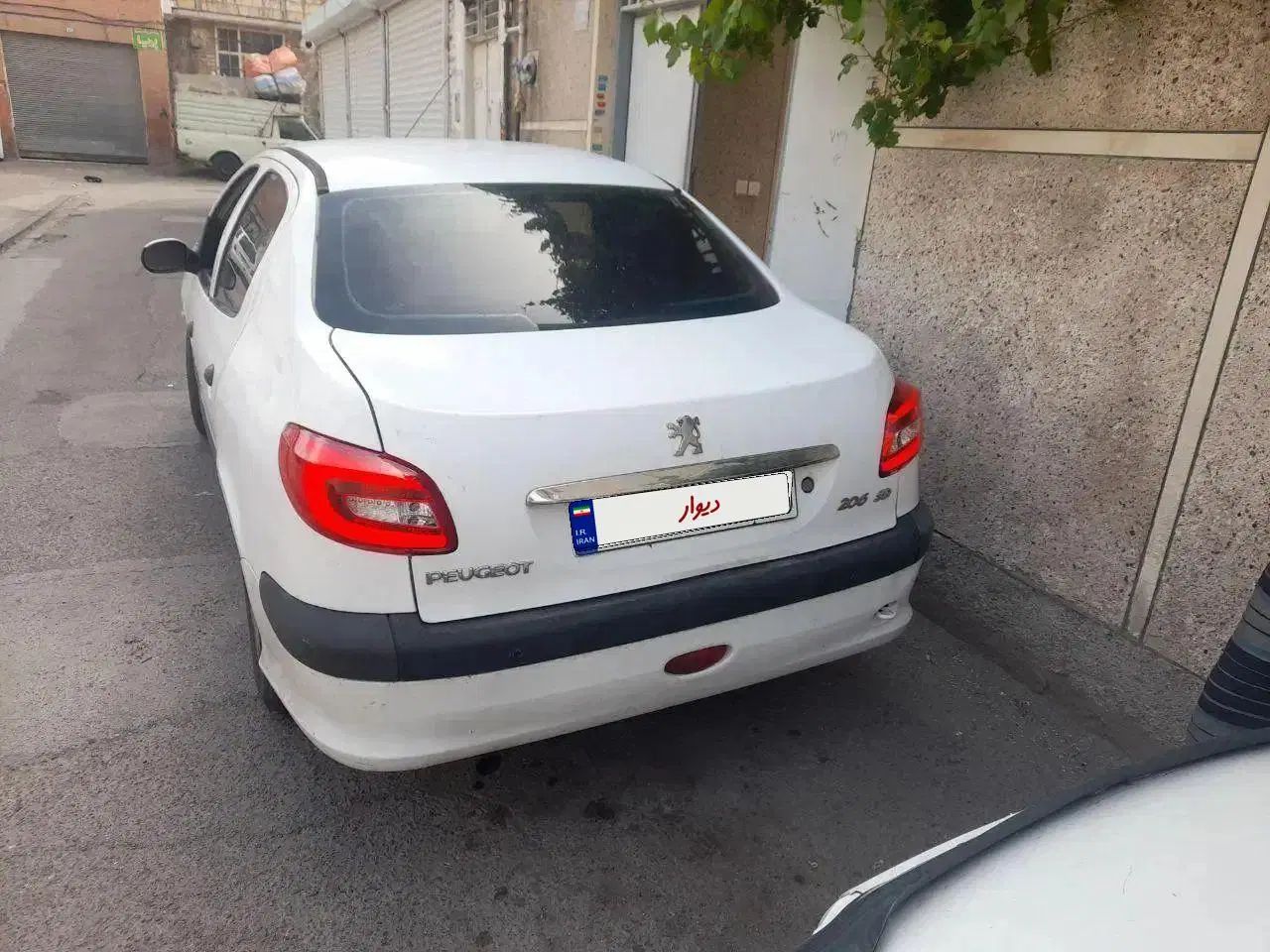 پژو ۲۰۶ صندوق دار v8 - 1394