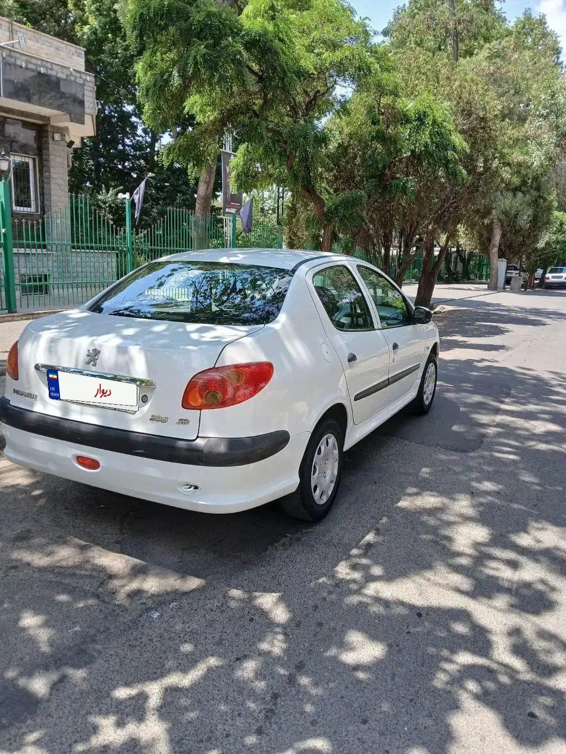 پژو ۲۰۶ صندوق دار v8 - 1393