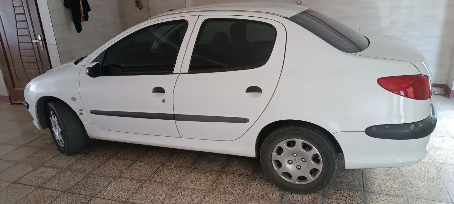 پژو ۲۰۶ صندوق دار v8 - 1396