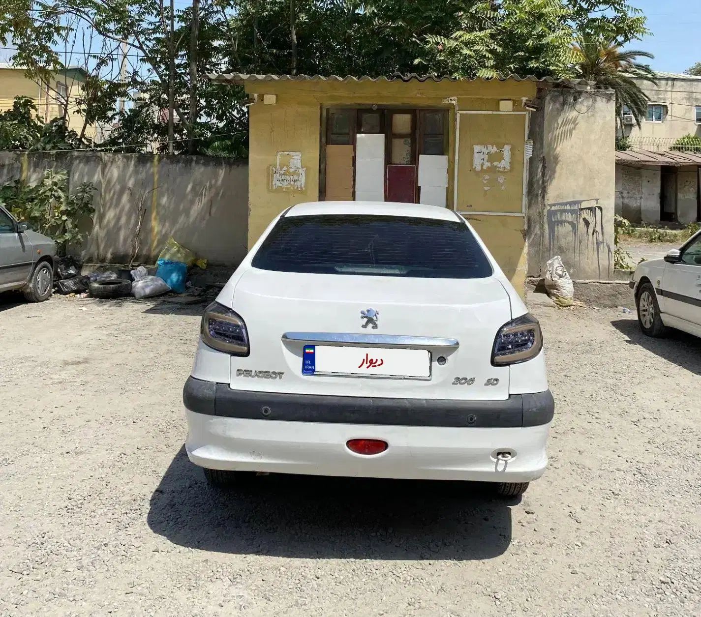 پژو ۲۰۶ صندوق دار v8 - 1396