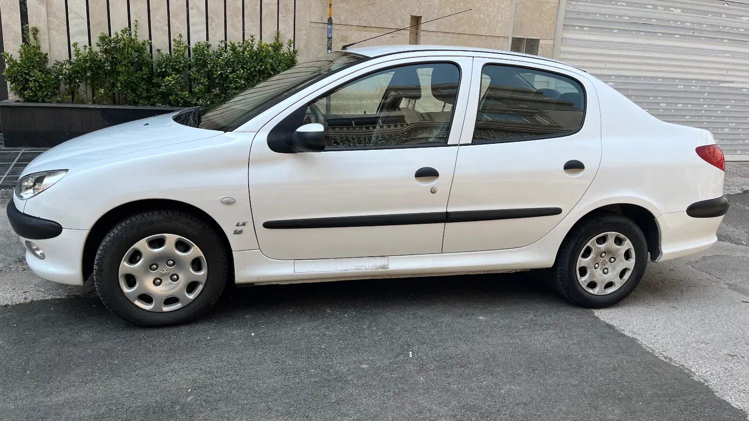 پژو ۲۰۶ صندوق دار v8 - 1398