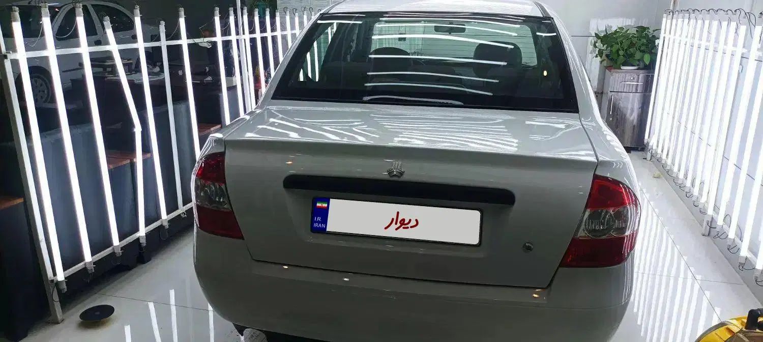 تیبا صندوق دار SX - 1401