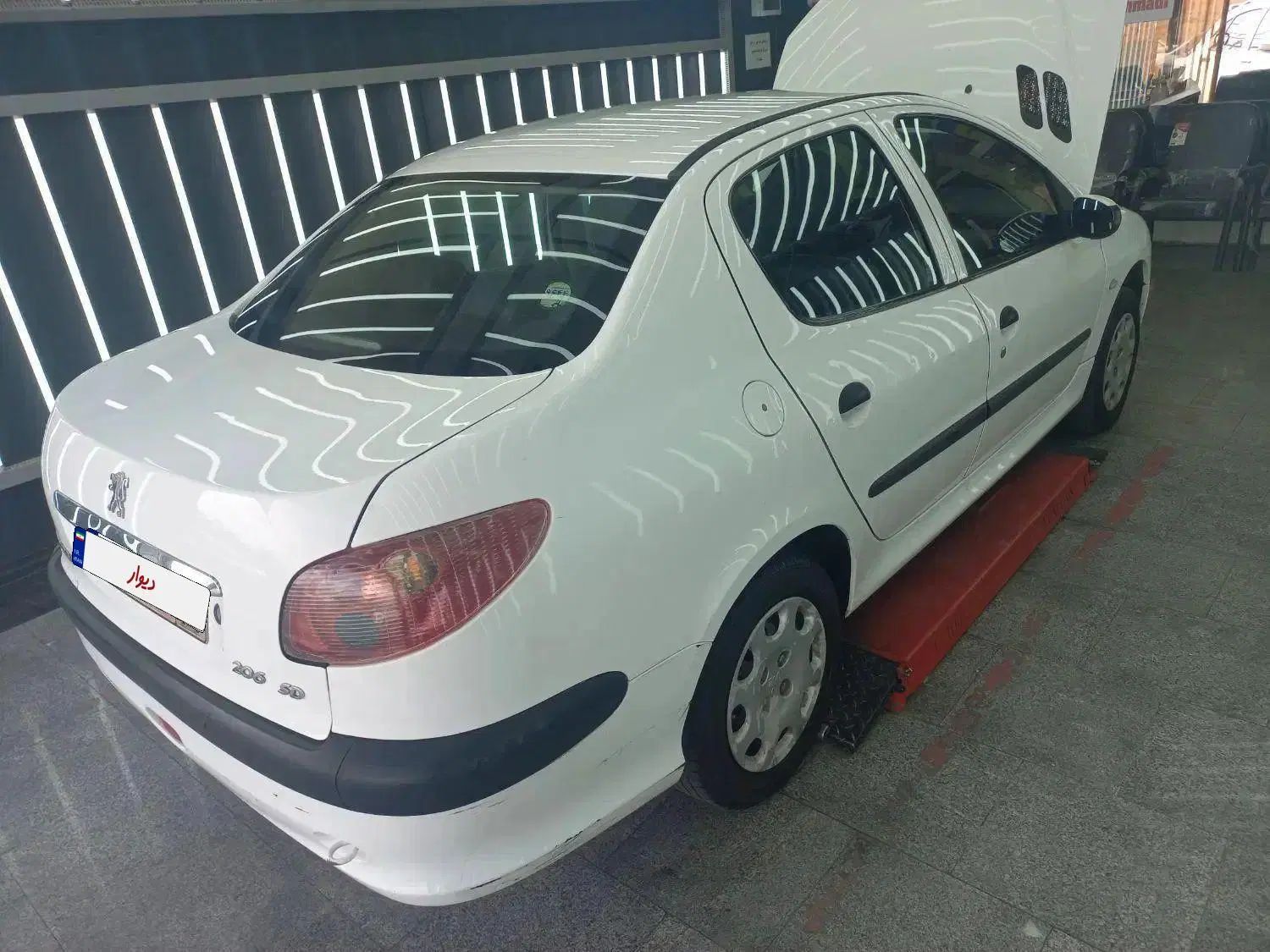 پژو ۲۰۶ صندوق دار v8 - 1391