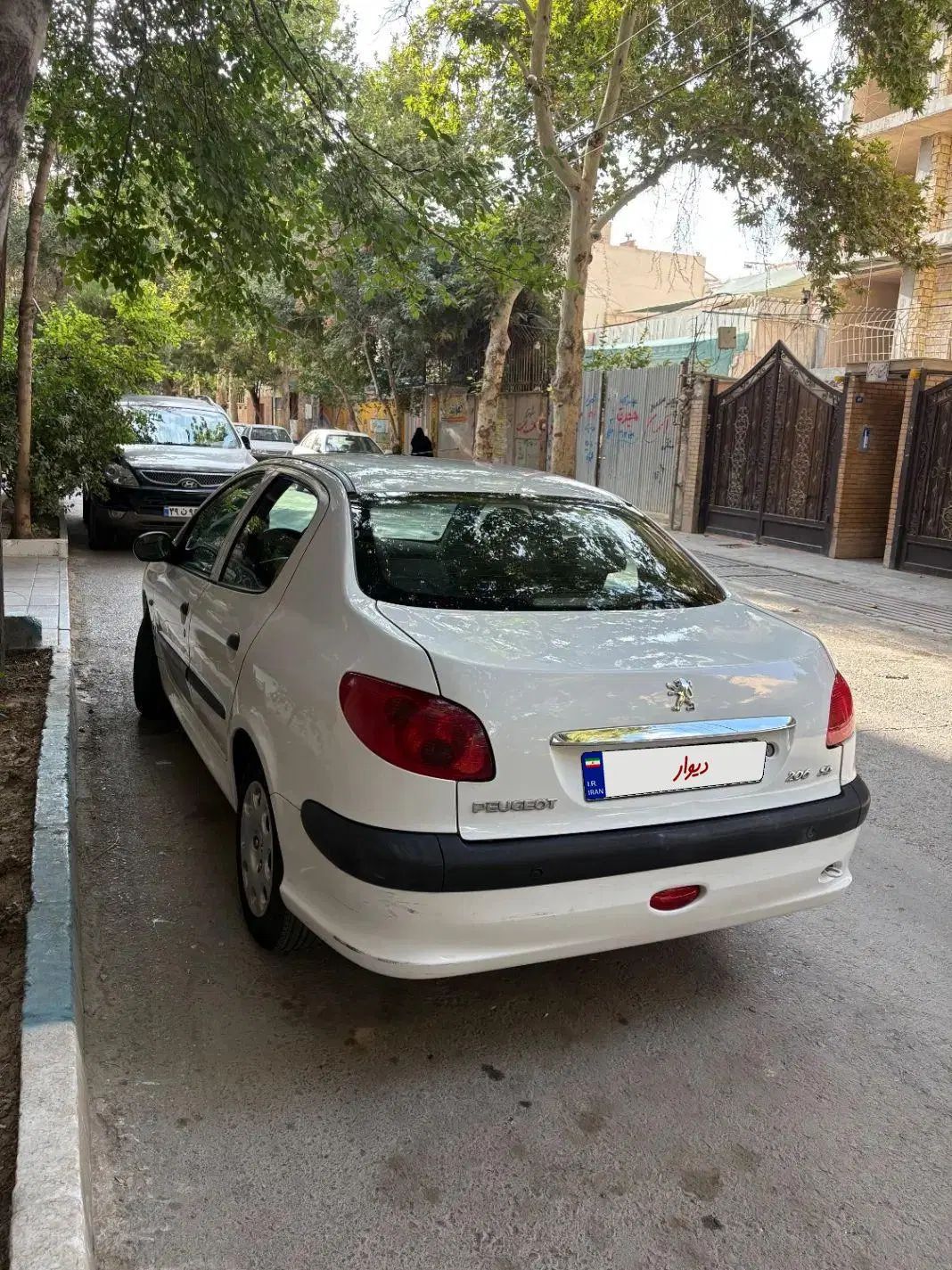 پژو ۲۰۶ صندوق دار v8 - 1396