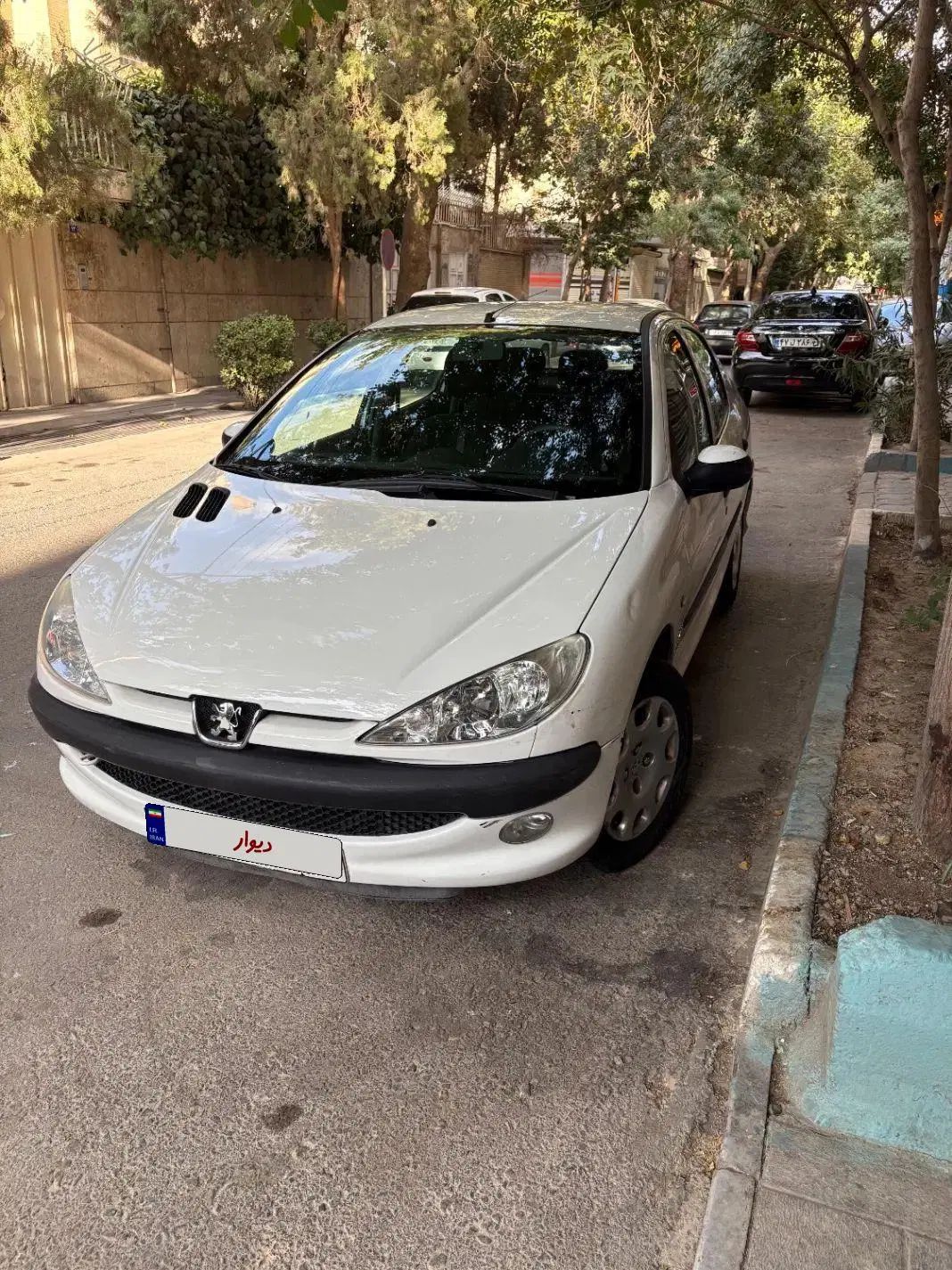 پژو ۲۰۶ صندوق دار v8 - 1396