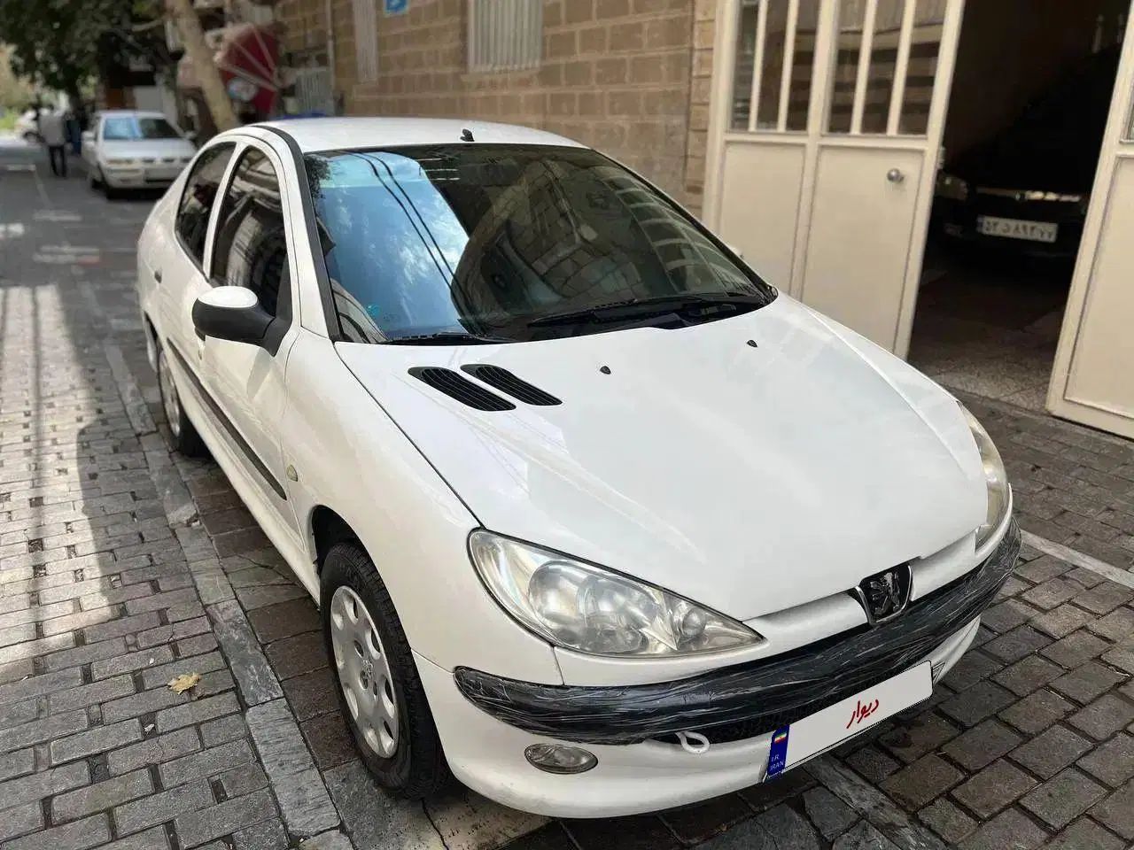 پژو ۲۰۶ صندوق دار v8 - 1397