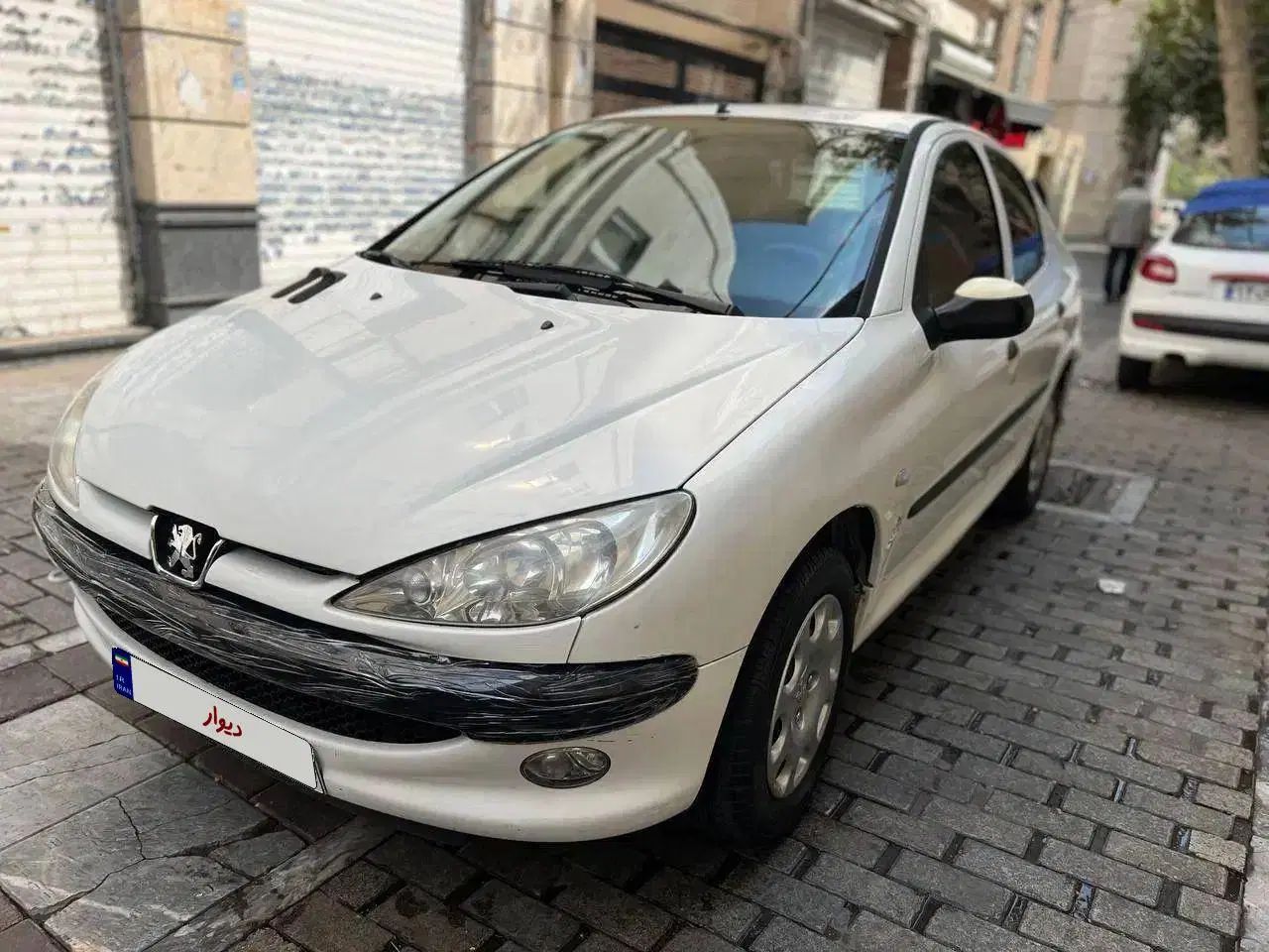 پژو ۲۰۶ صندوق دار v8 - 1397