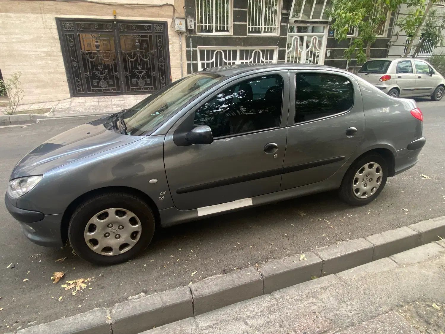 پژو ۲۰۶ صندوق دار v8 - 1397