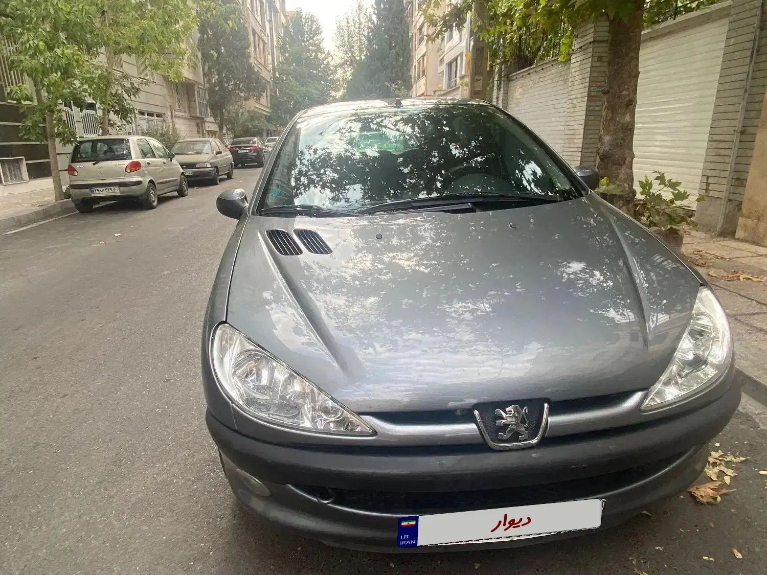 پژو ۲۰۶ صندوق دار v8 - 1397