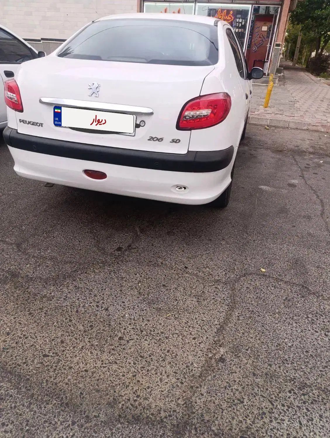 پژو ۲۰۶ صندوق دار v8 - 1393