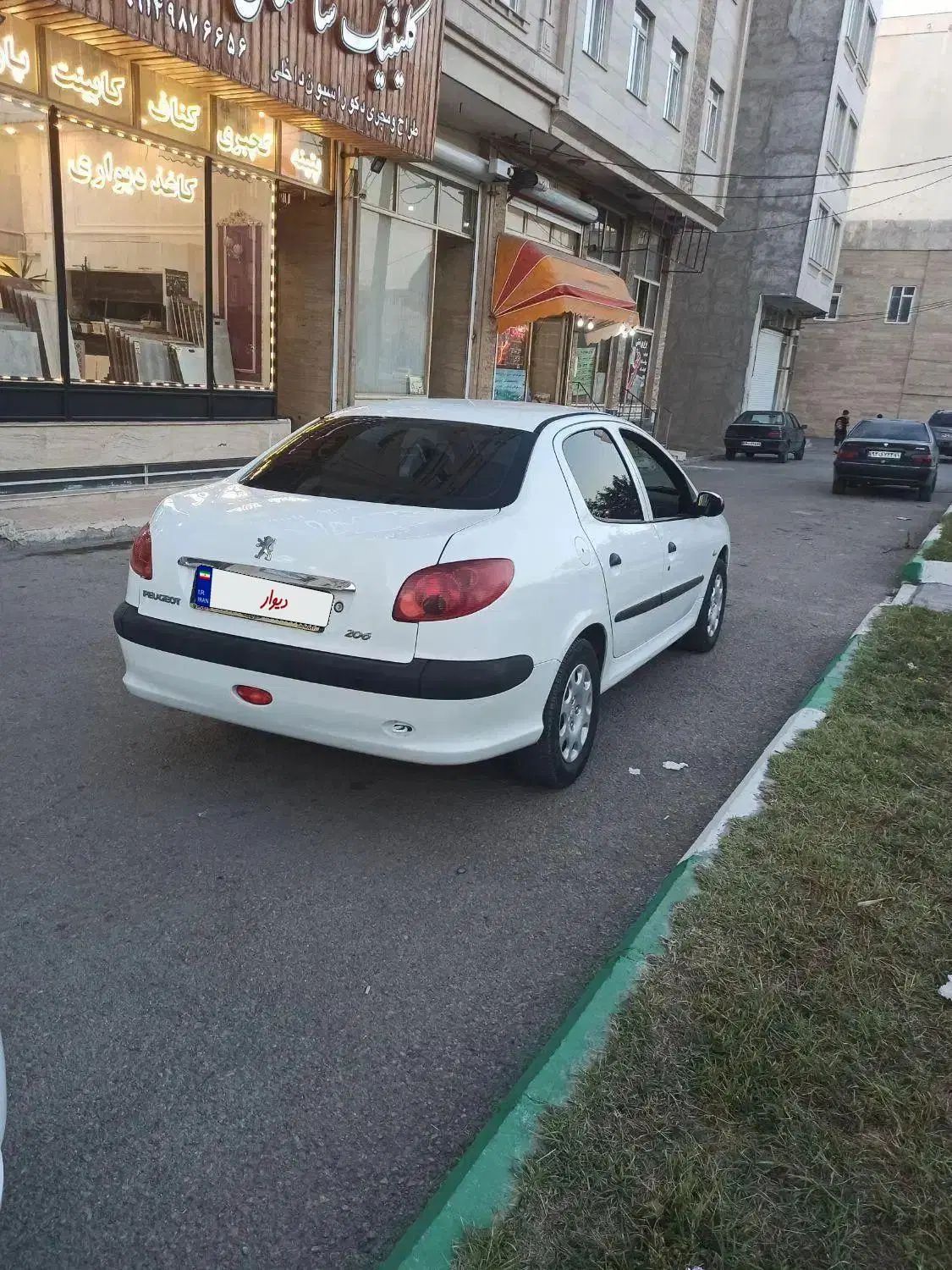 پژو ۲۰۶ صندوق دار v8 - 1394