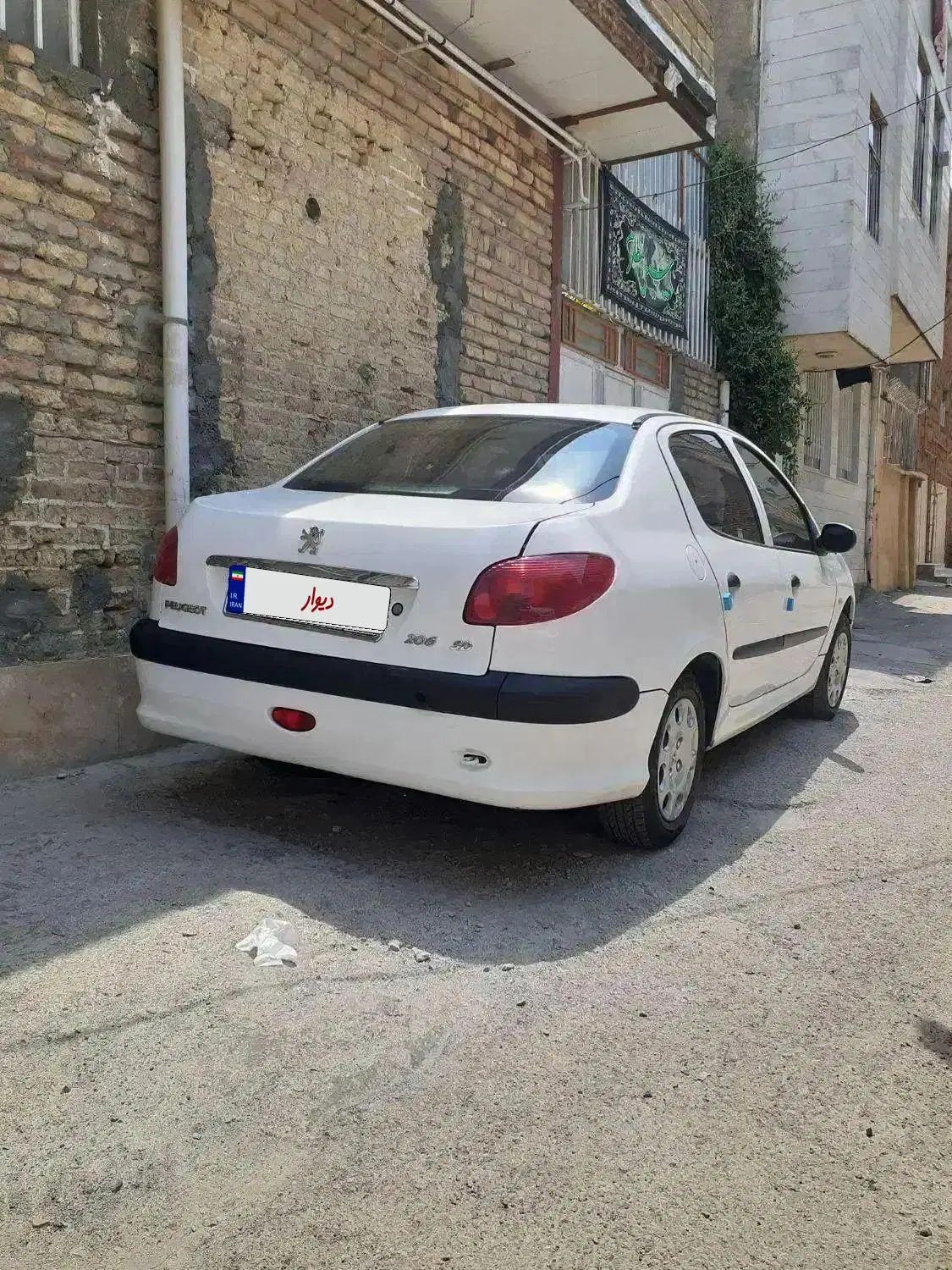 پژو ۲۰۶ صندوق دار v8 - 1398