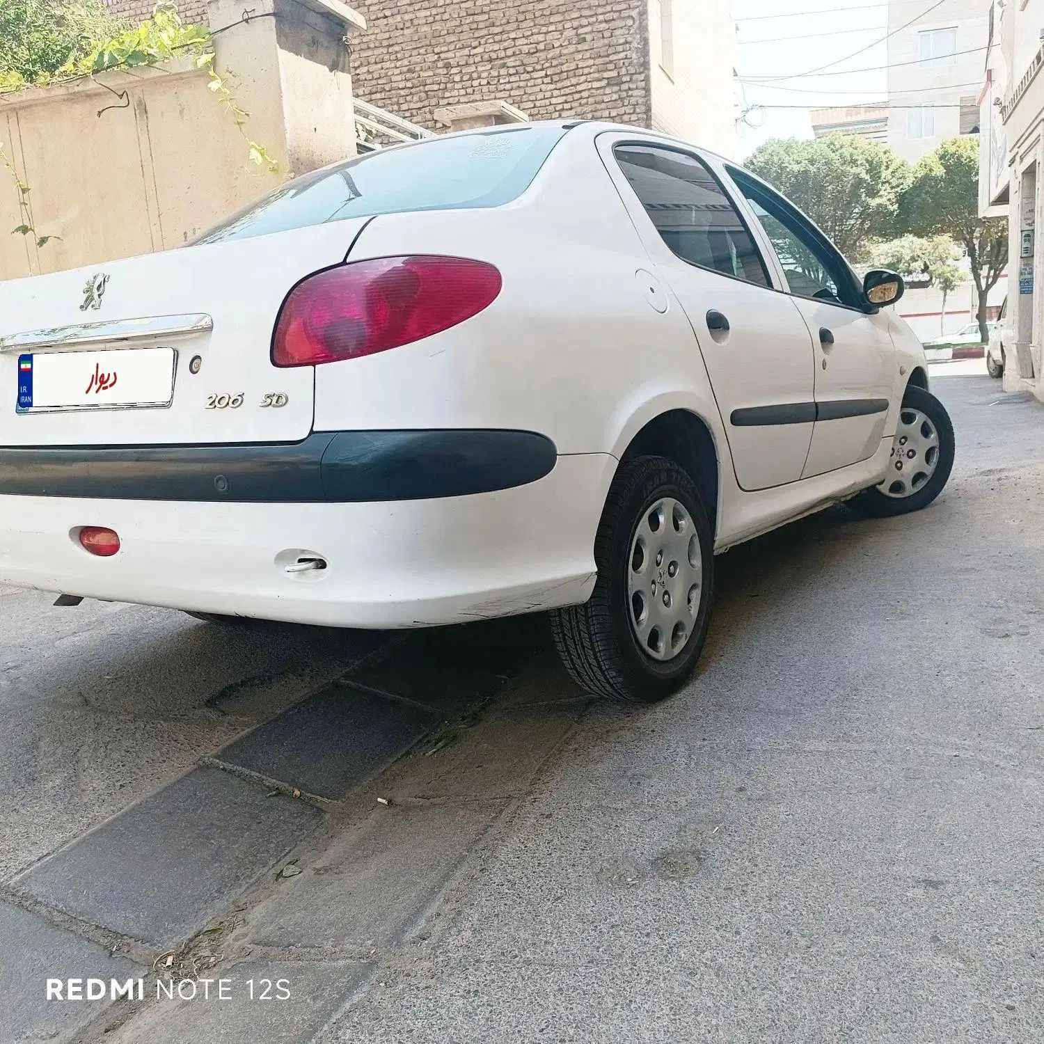 پژو ۲۰۶ صندوق دار v8 - 1396