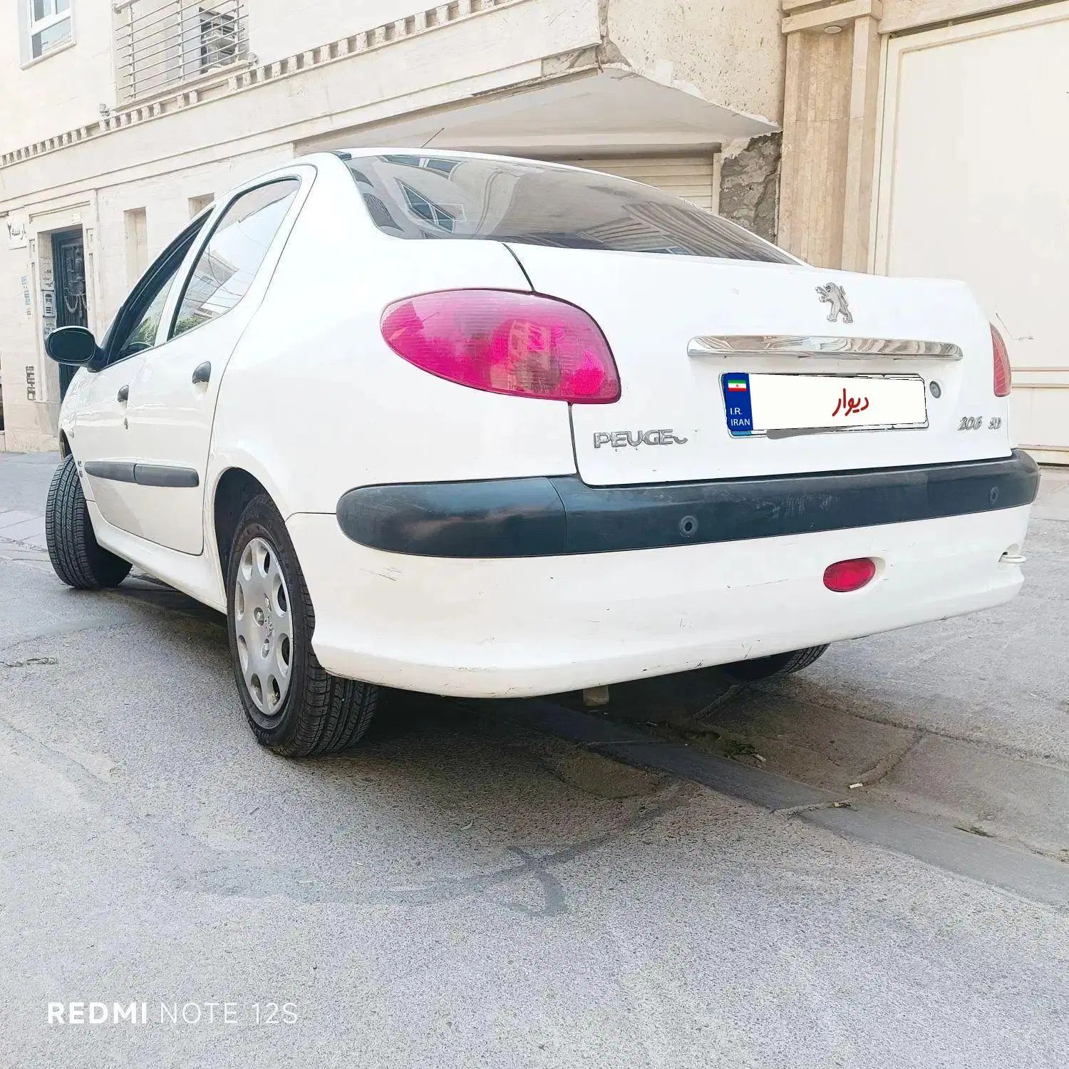 پژو ۲۰۶ صندوق دار v8 - 1396