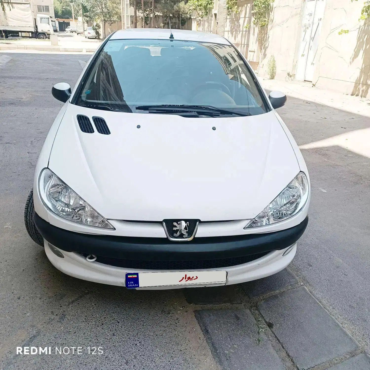 پژو ۲۰۶ صندوق دار v8 - 1396