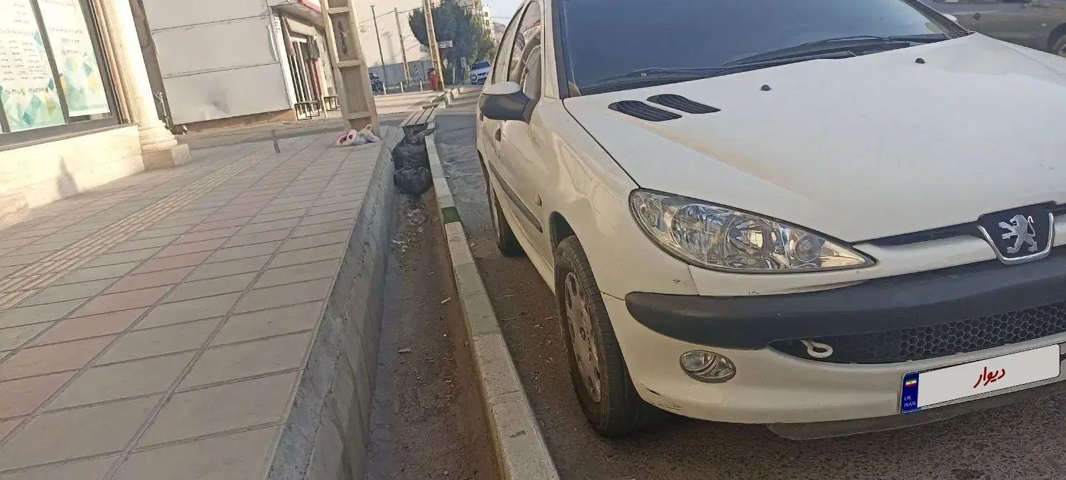 پژو ۲۰۶ صندوق دار v8 - 1397
