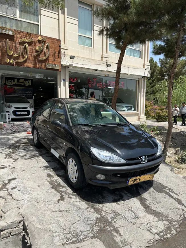 پژو ۲۰۶ صندوق دار v8 - 1396