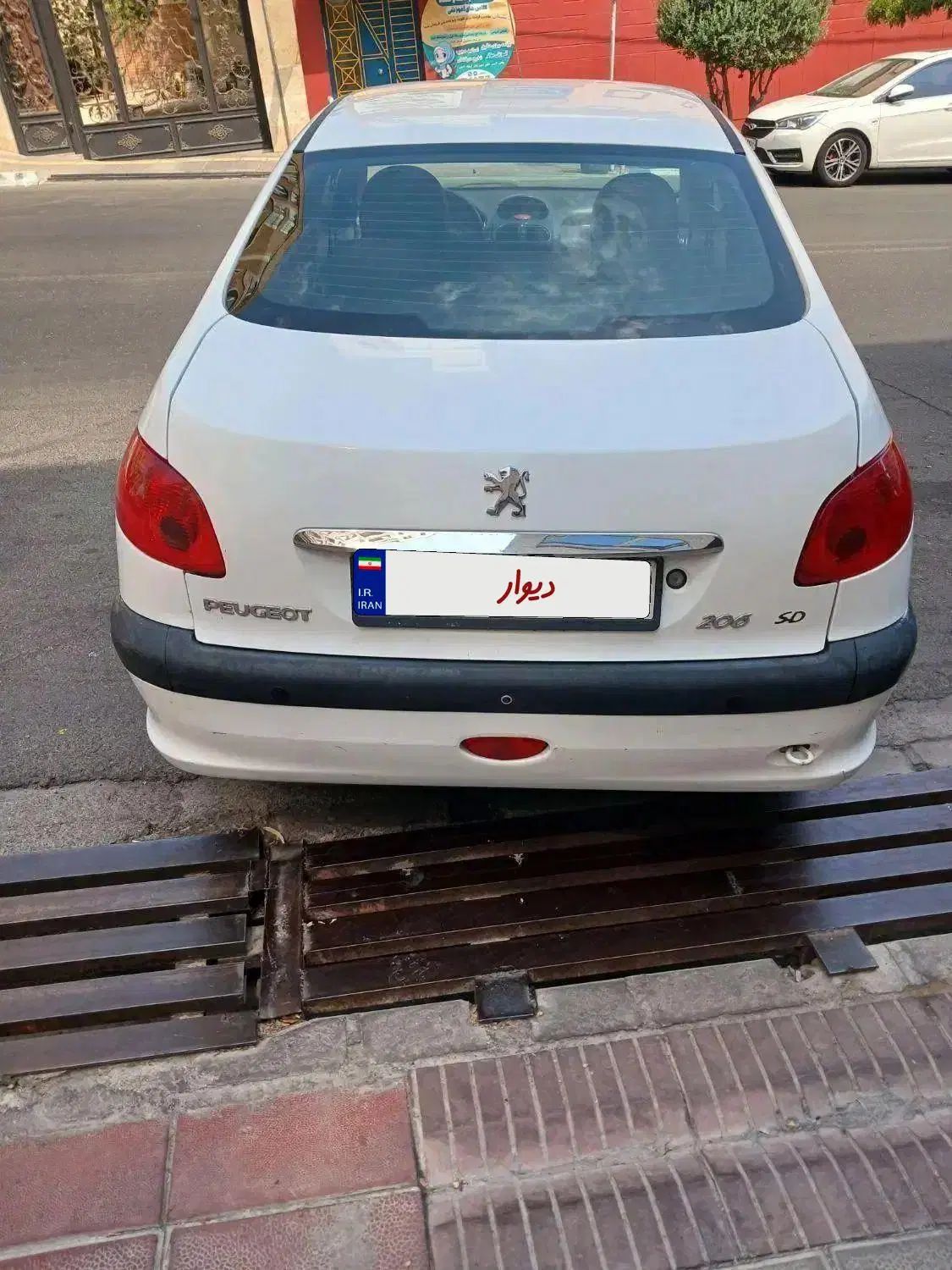 پژو ۲۰۶ صندوق دار v8 - 1394