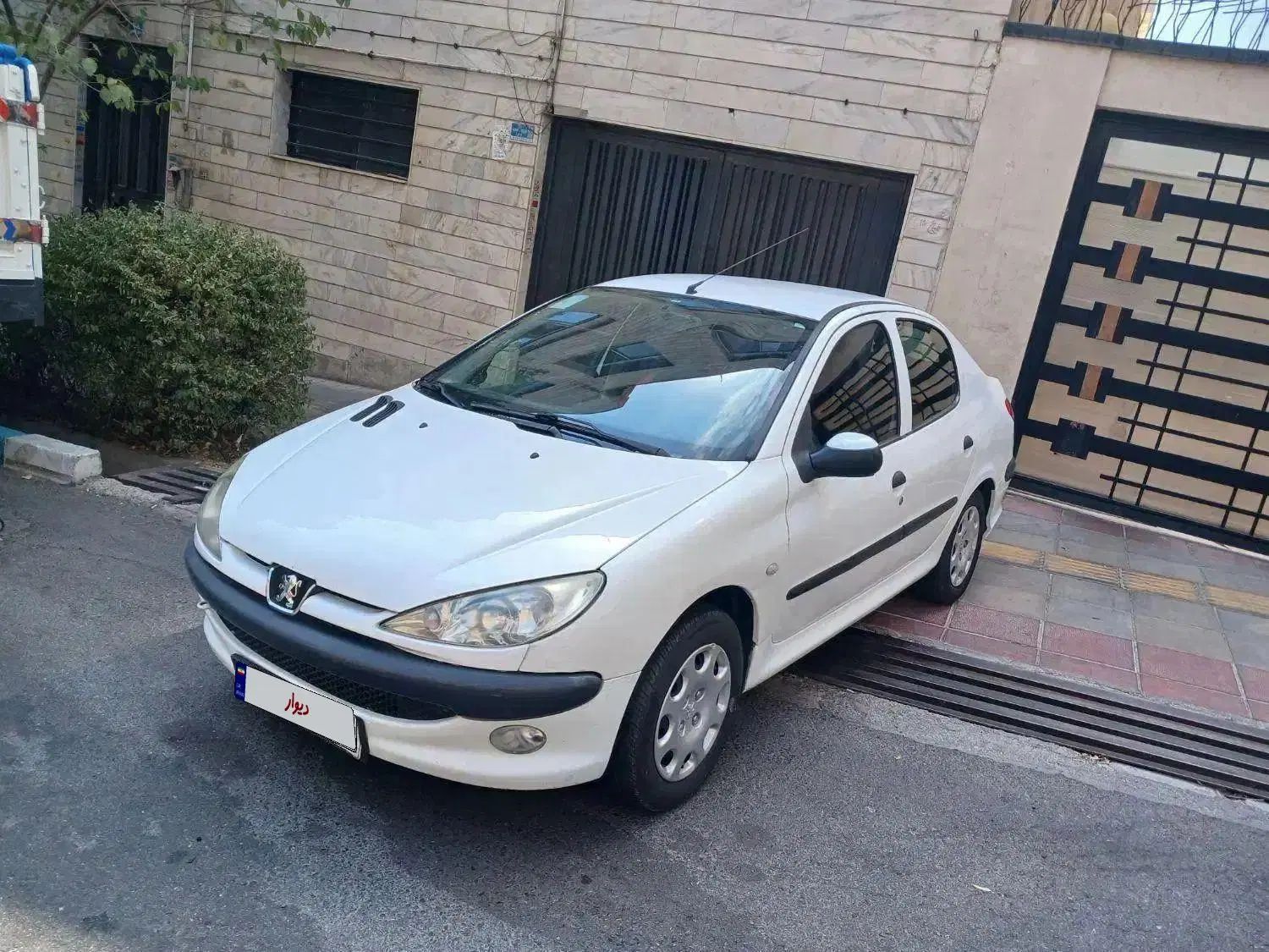 پژو ۲۰۶ صندوق دار v8 - 1394