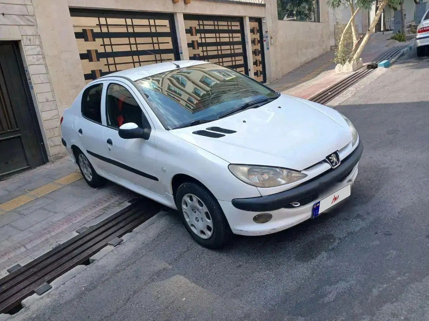 پژو ۲۰۶ صندوق دار v8 - 1394