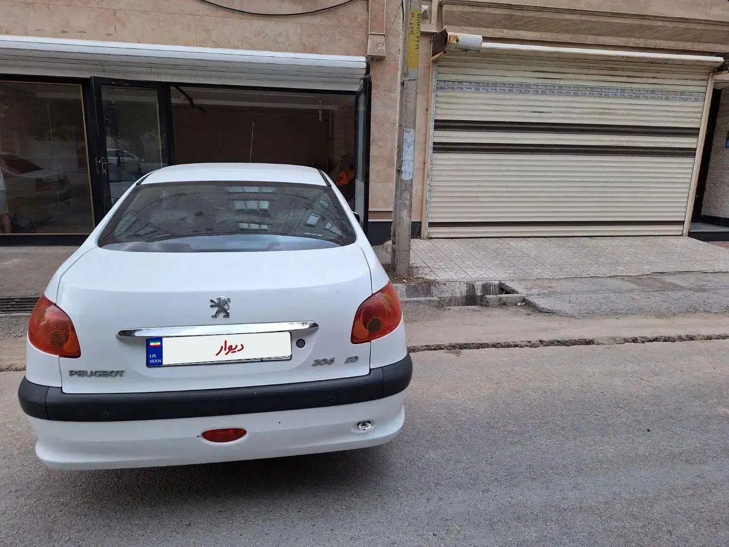 پژو ۲۰۶ صندوق دار v8 - 1393