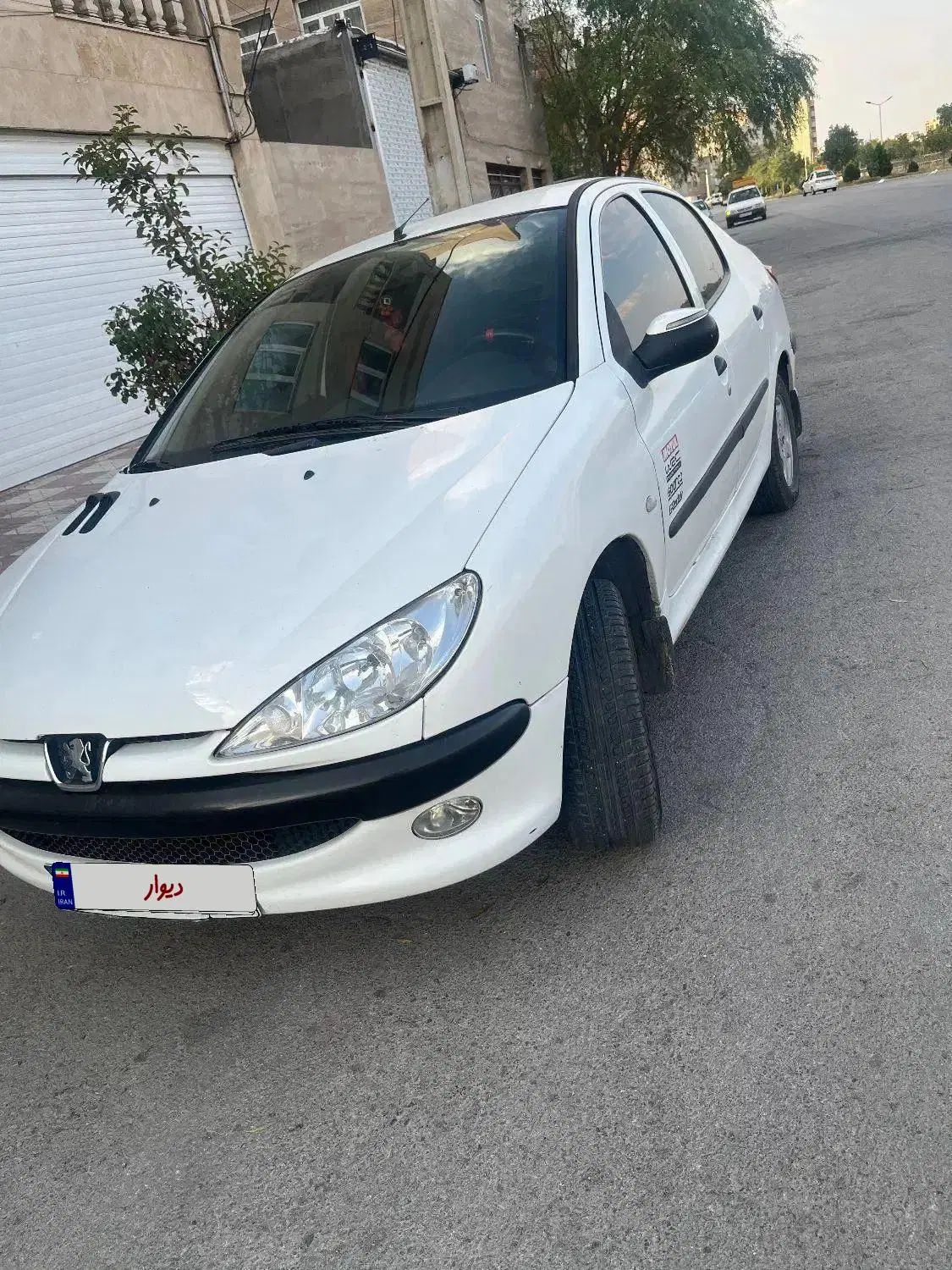پژو ۲۰۶ صندوق دار v6 - 1390