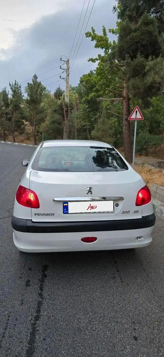 پژو ۲۰۶ صندوق دار v8 - 1397