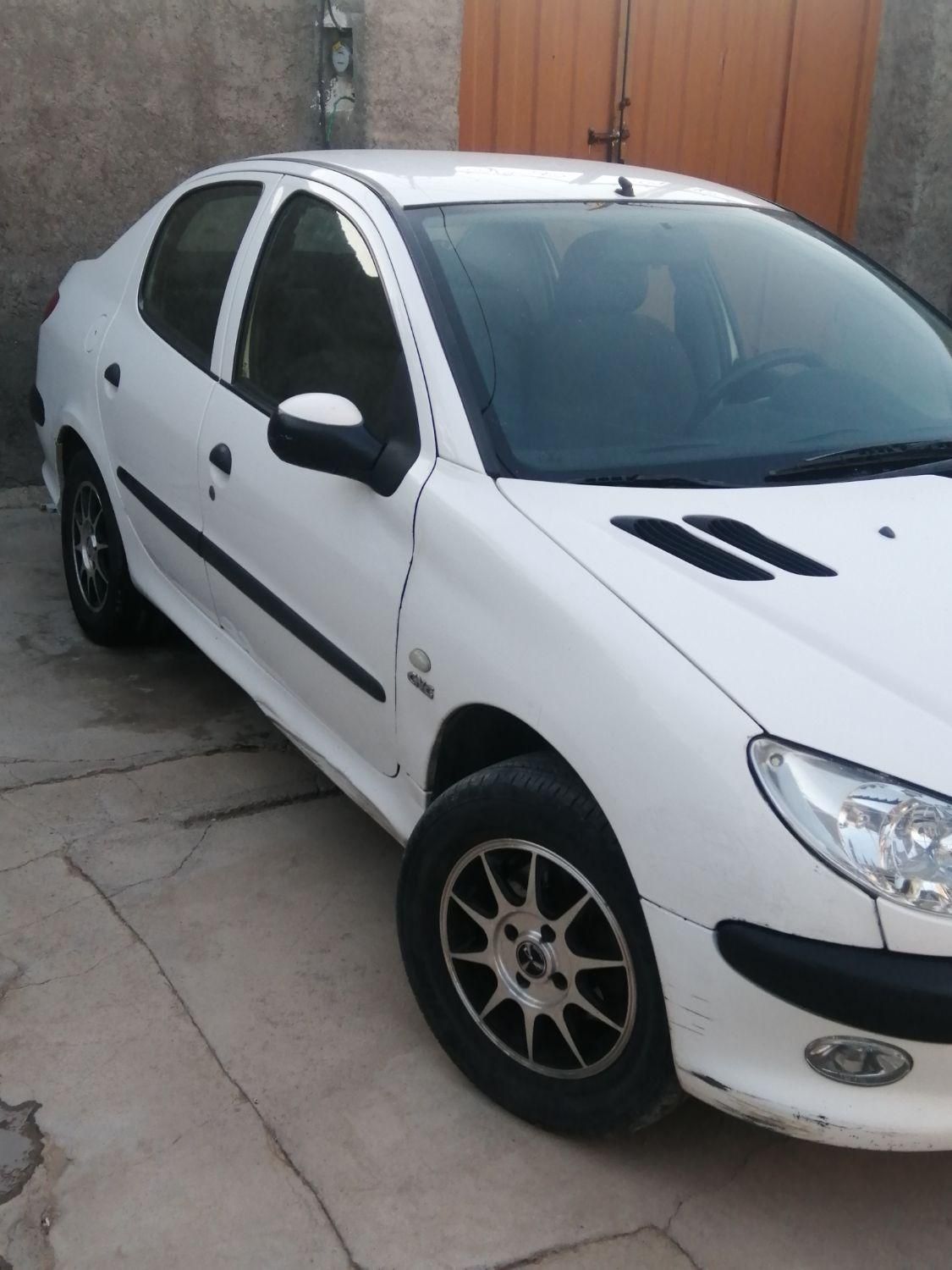 پژو ۲۰۶ صندوق دار v8 - 1391