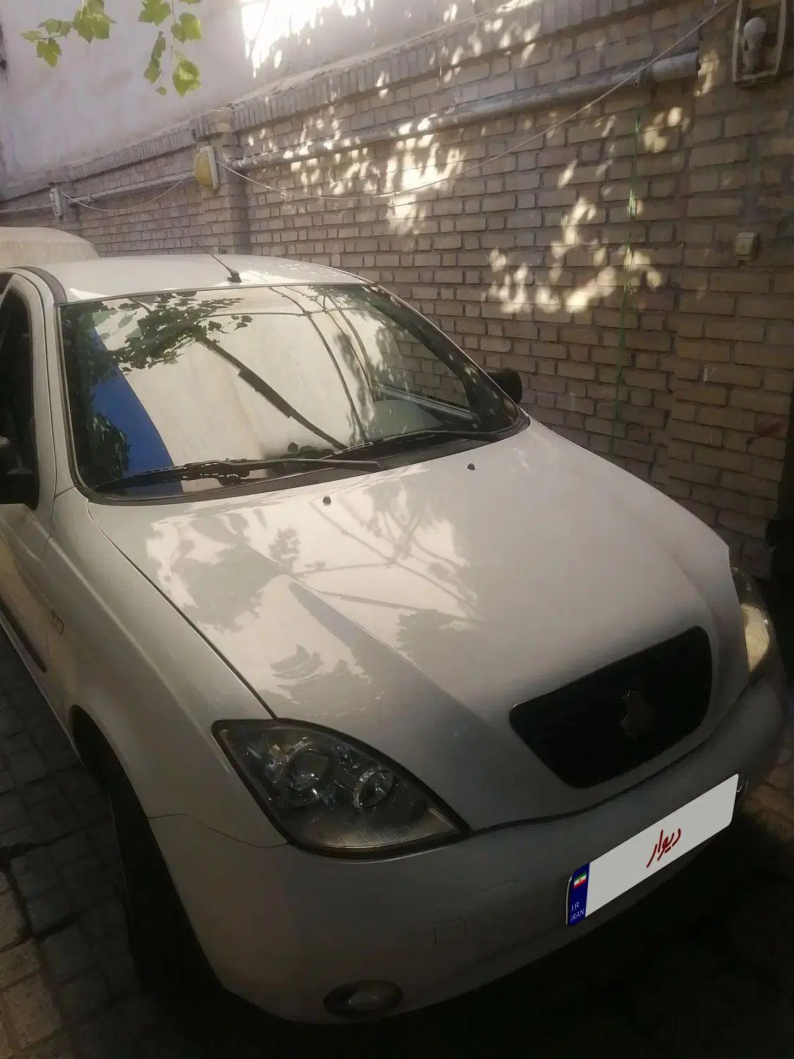 تیبا صندوق دار SX - 1400