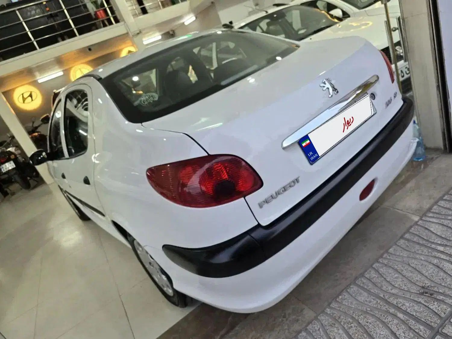 پژو ۲۰۶ صندوق دار v8 - 1398