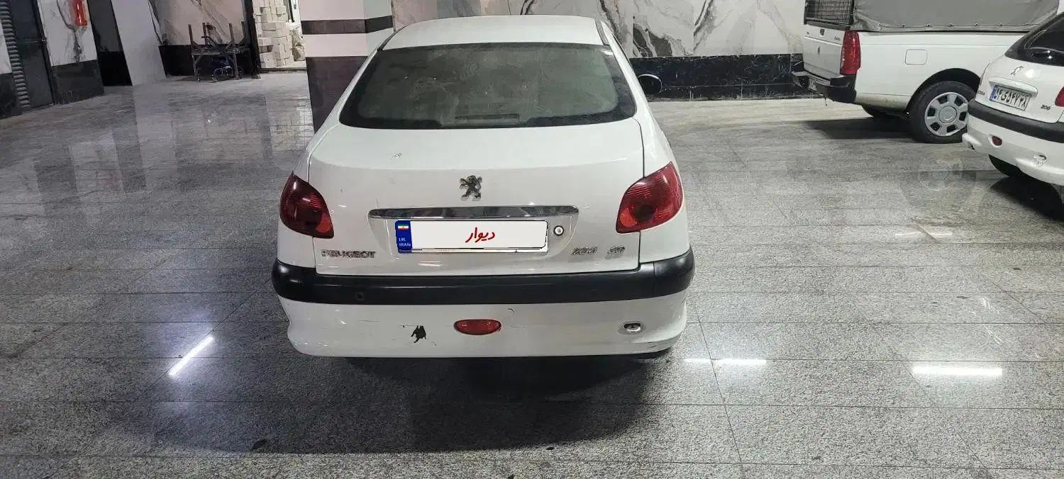 پژو ۲۰۶ صندوق دار v8 - 1396