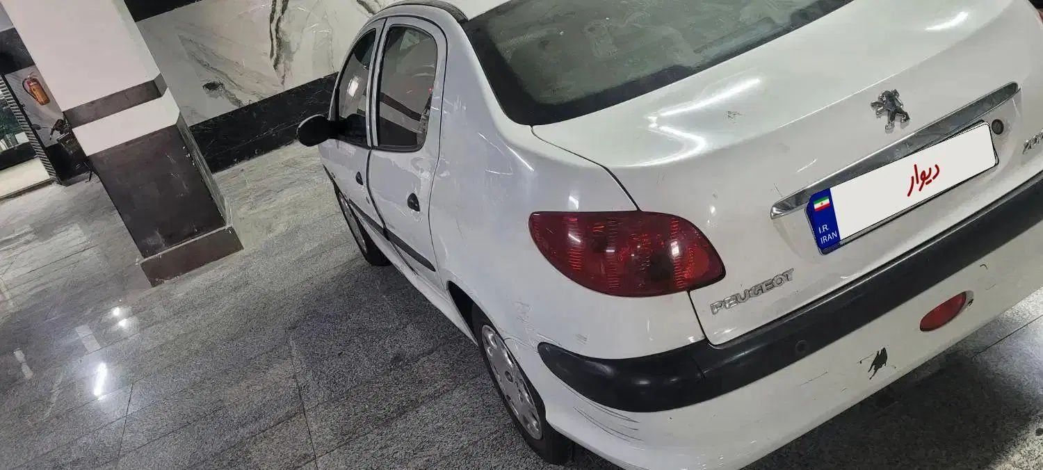 پژو ۲۰۶ صندوق دار v8 - 1396