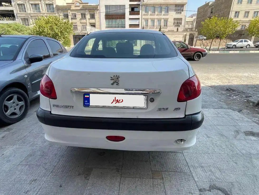 پژو ۲۰۶ صندوق دار v8 - 1396