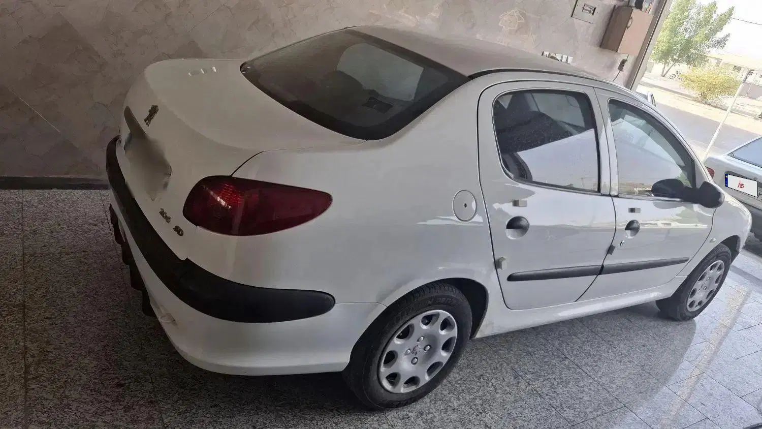 پژو ۲۰۶ صندوق دار v8 - 1396