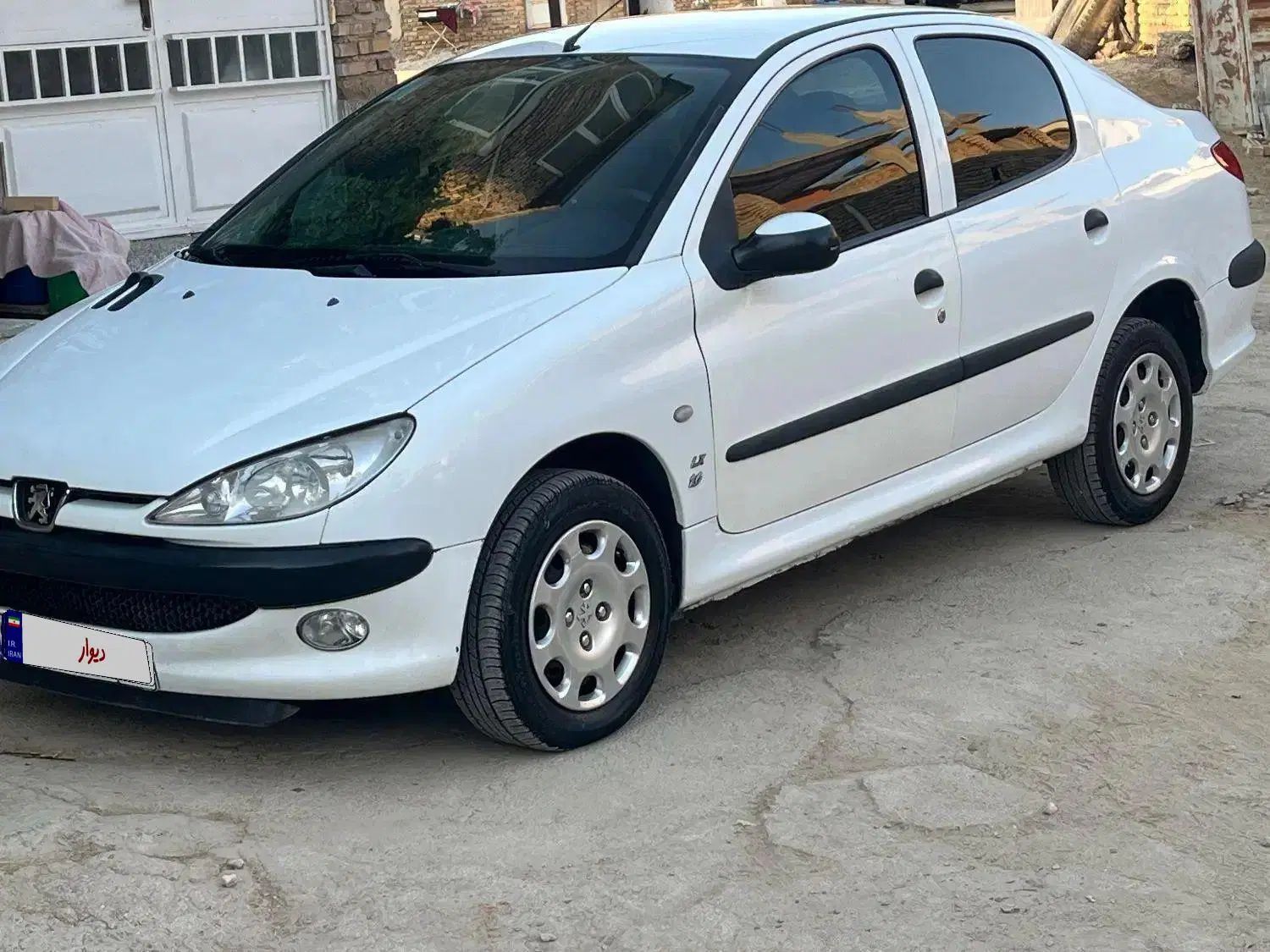 پژو ۲۰۶ صندوق دار v8 - 1394