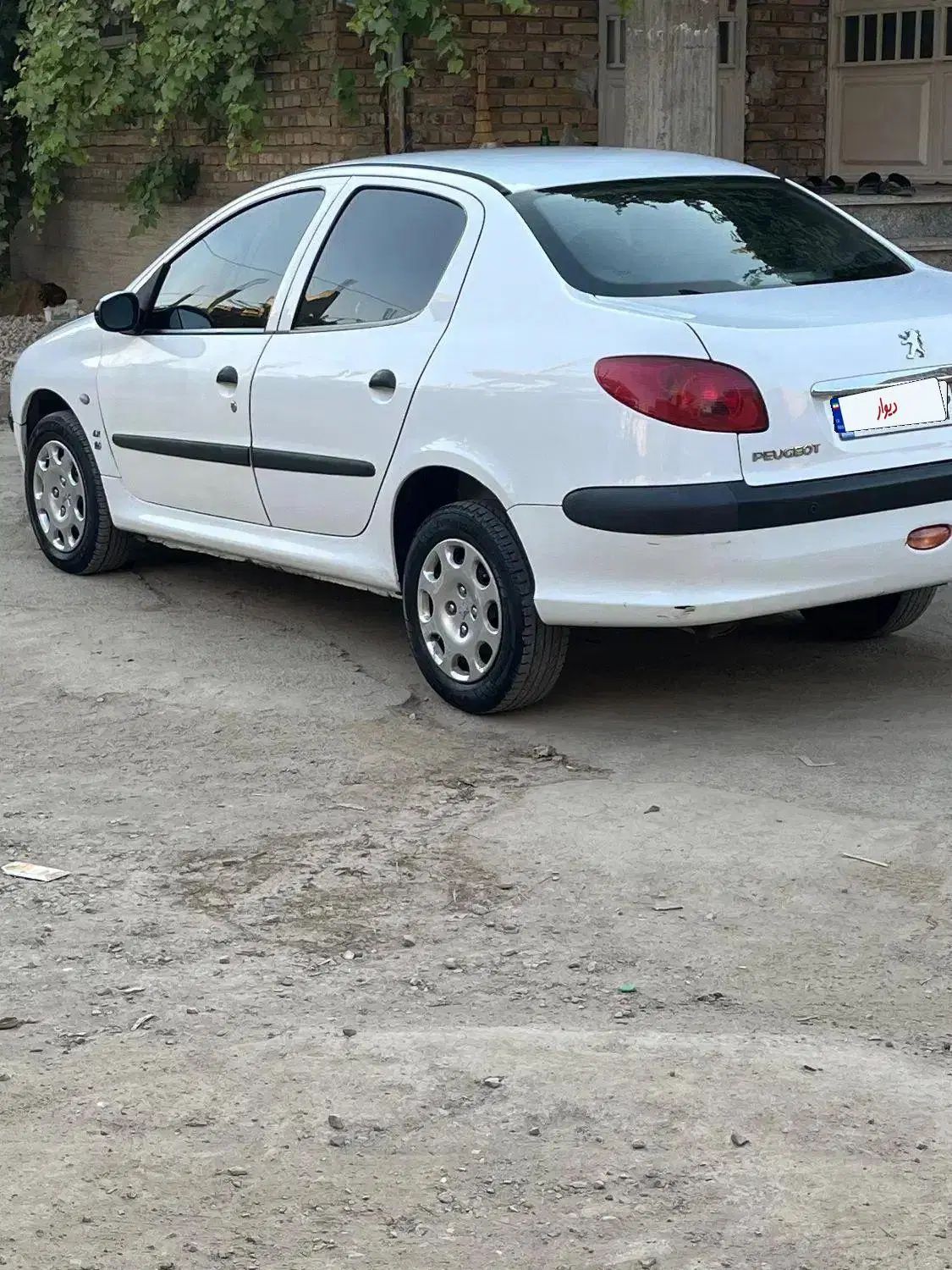 پژو ۲۰۶ صندوق دار v8 - 1394