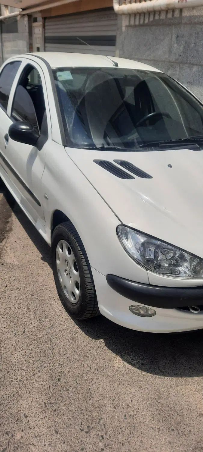 پژو ۲۰۶ صندوق دار v8 - 1396