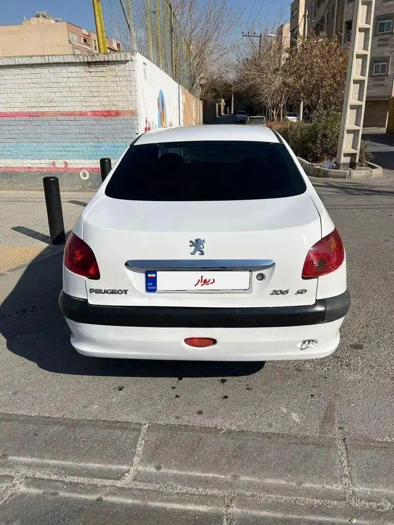 پژو ۲۰۶ صندوق دار v8 - 1391