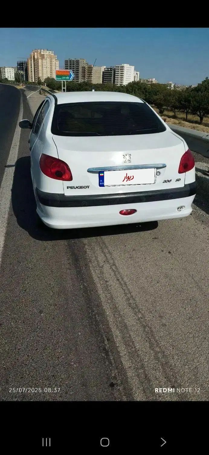 پژو ۲۰۶ صندوق دار v8 - 1394