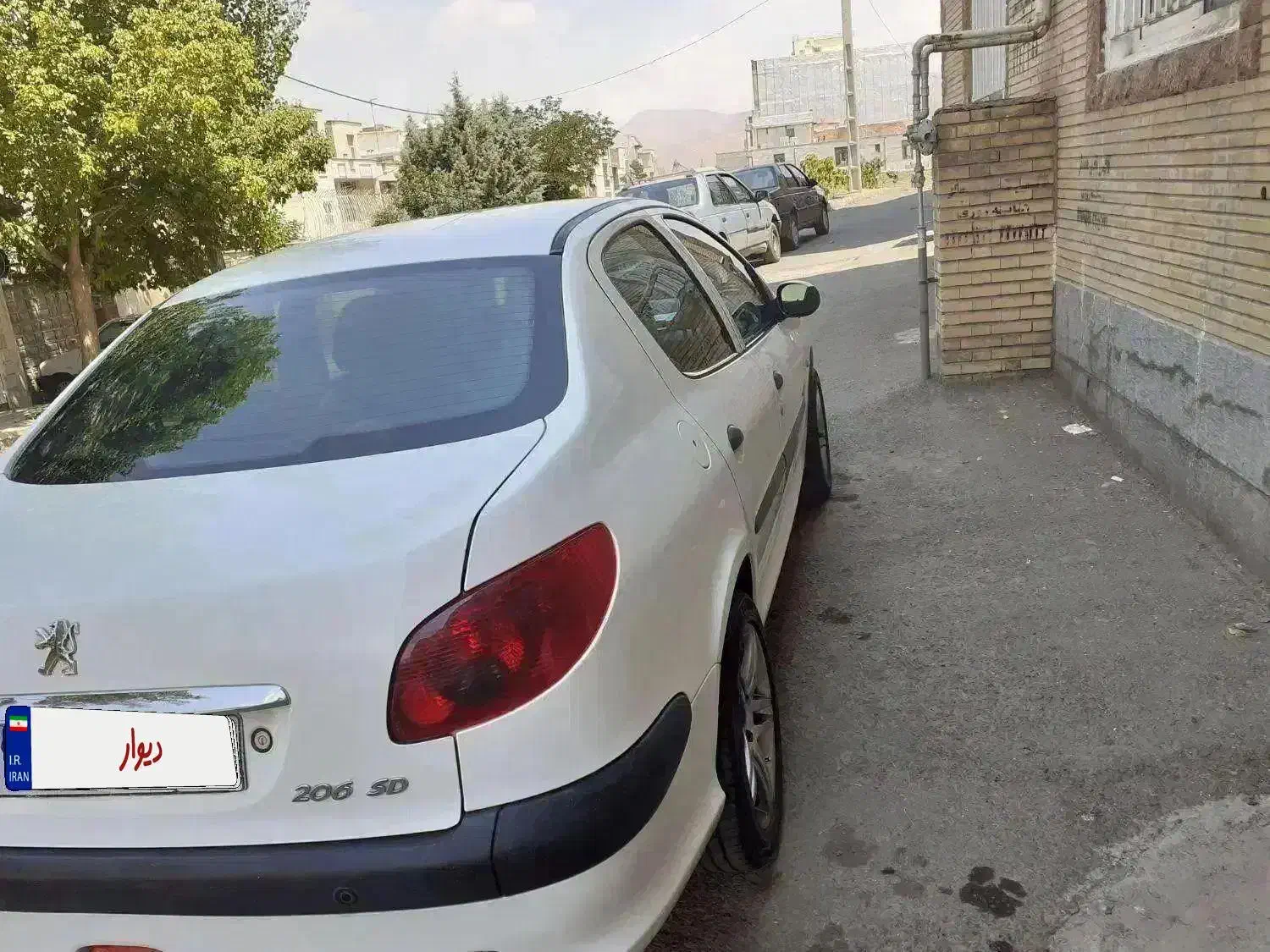 پژو ۲۰۶ صندوق دار v8 - 1394