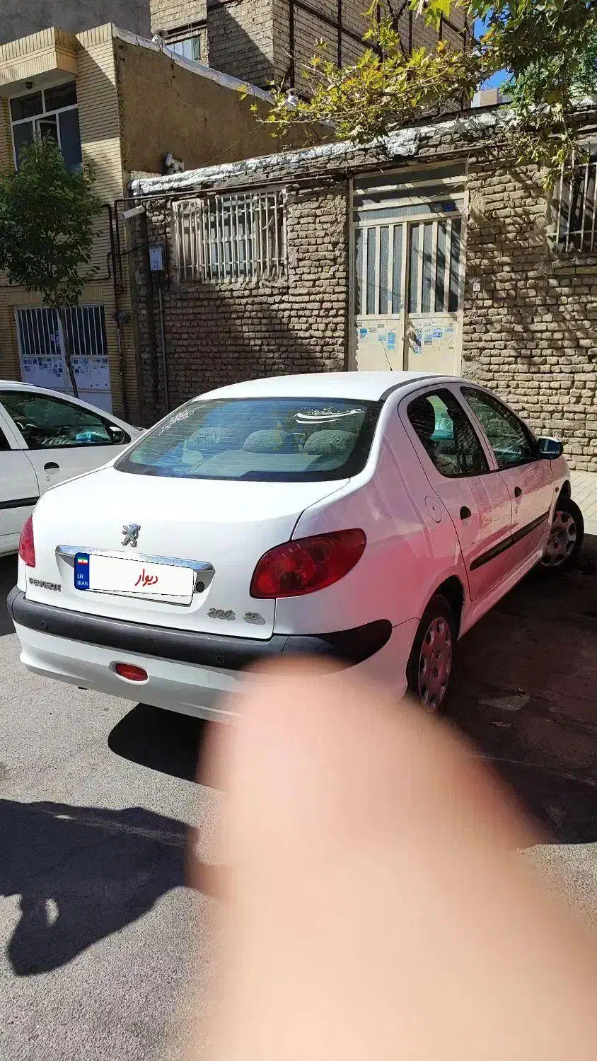 پژو ۲۰۶ صندوق دار v8 - 1395