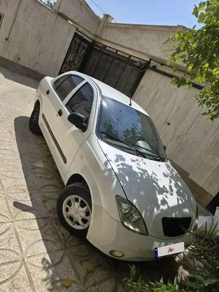 تیبا صندوق دار SX - 1392