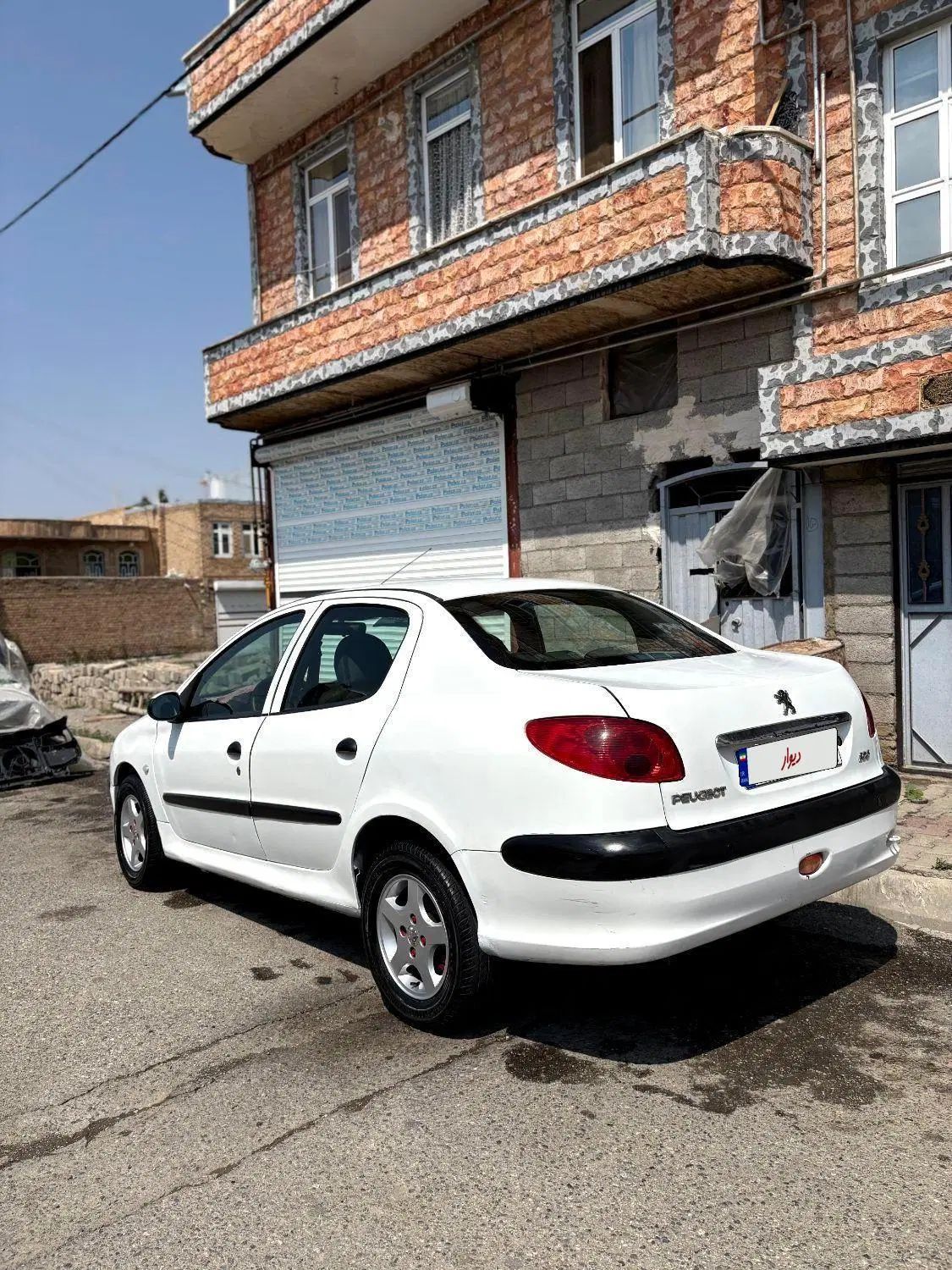 پژو ۲۰۶ صندوق دار v8 - 1396