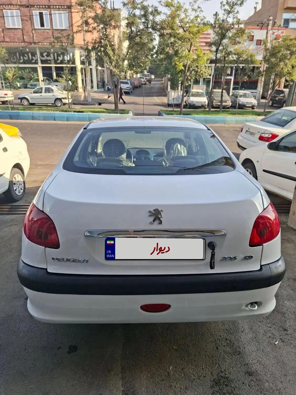 پژو ۲۰۶ صندوق دار v8 - 1396