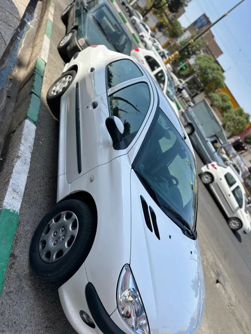 پژو ۲۰۶ صندوق دار v8 - 1396
