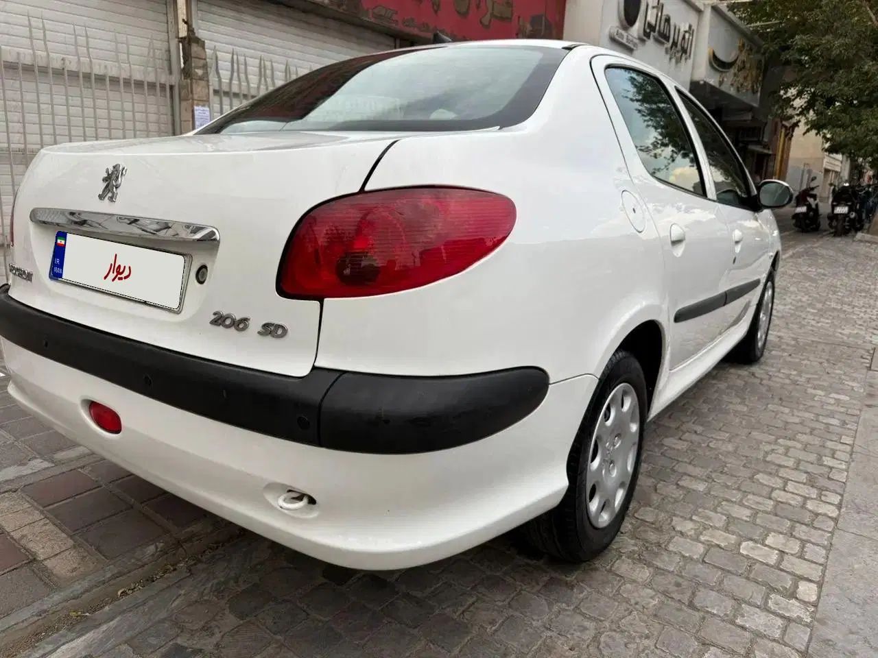 پژو ۲۰۶ صندوق دار v9 - 1389